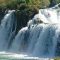 You simply must visit the Krka waterfalls!