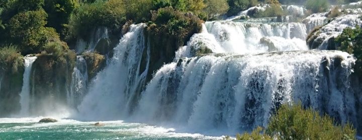 You simply must visit the Krka waterfalls!