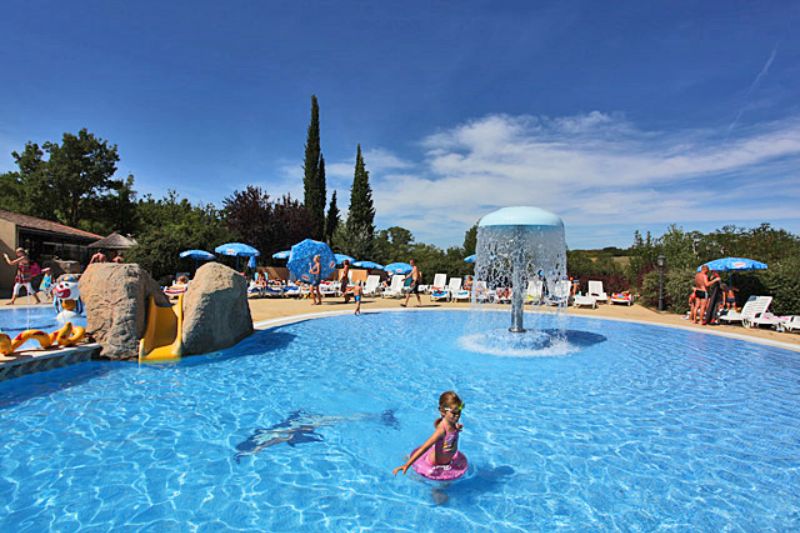 Splashing in the outdoor pool.